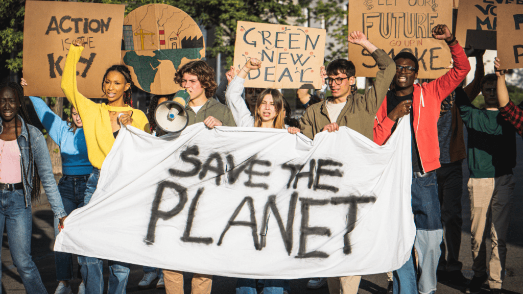 a group of people holding a sign