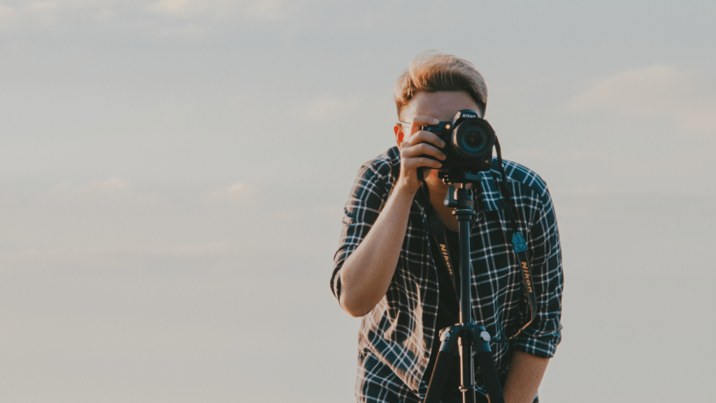 a person holding a camera